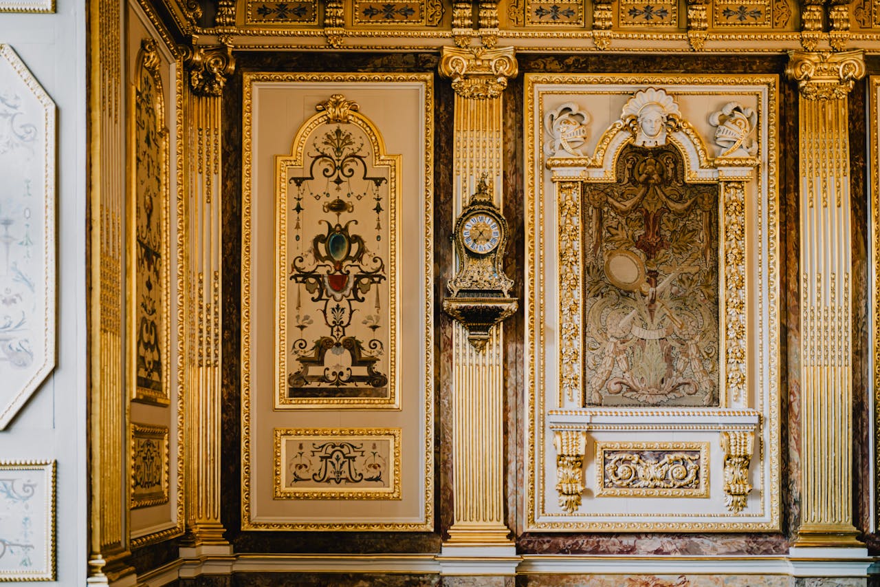 Luxurious gilded interior details featuring classic French architecture in a historical Rennes building.